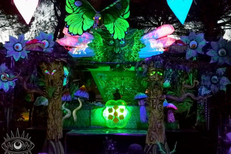 Festival Installation main stage psychedelic lycra themed art event decor hire green man transition Spain nature organic art projections